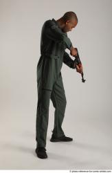 Man Adult Average Black Fighting with gun Standing poses Army